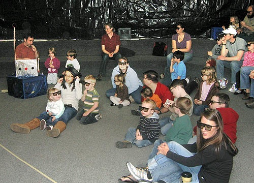 The audience enjoys the "Discover 3-D" program